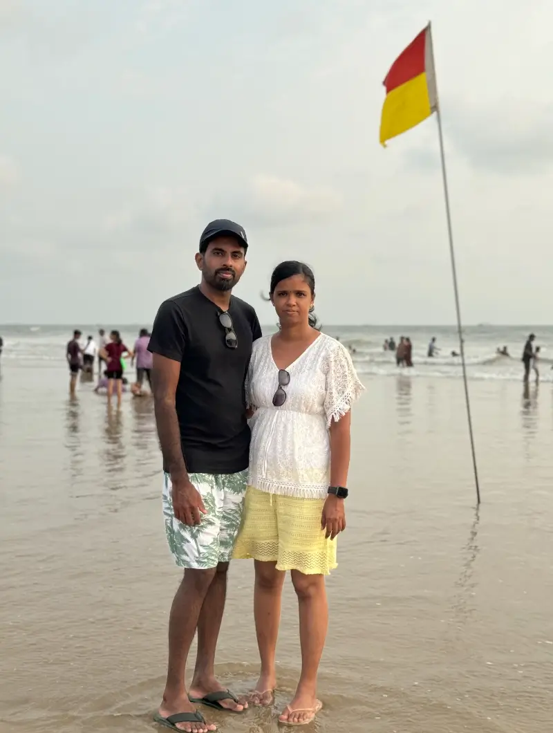 Tijo and his wife at the beach